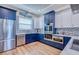 Well-lit kitchen featuring custom cabinets, stainless steel appliances, and modern finishes at 6613 Josie Ln, Hudson, FL 34667
