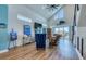 Spacious living room with high ceilings, decor, and cozy seating area at 6613 Josie Ln, Hudson, FL 34667