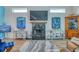 Bright living room featuring a marble fireplace and coastal decor at 6613 Josie Ln, Hudson, FL 34667