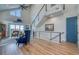 Open-concept living room with staircase and view of the waterfront at 6613 Josie Ln, Hudson, FL 34667