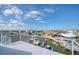 Stunning rooftop view of a waterfront community with boat docks under a blue sky on a sunny day at 6613 Josie Ln, Hudson, FL 34667