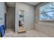 Unfinished room with a view to the outside and a door leading to a toilet at 6613 Josie Ln, Hudson, FL 34667