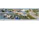 Beautiful waterfront view showcasing the tranquil canal and nearby residences from a rooftop perspective at 6613 Josie Ln, Hudson, FL 34667
