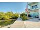 Waterfront home featuring a private boat dock and outdoor entertaining space by the canal at 6613 Josie Ln, Hudson, FL 34667