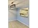 View of the dining room featuring an open serving hatch to the kitchen at 7109 Kirsch Ct # 2, New Port Richey, FL 34653