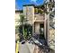 Two-story condo building featuring a stone facade and well-maintained landscaping at 7109 Kirsch Ct # 2, New Port Richey, FL 34653