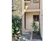 Exterior view of unit number 2 with beige walls and natural stone accents at 7109 Kirsch Ct # 2, New Port Richey, FL 34653