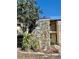 Two-story condo building featuring a stone facade and well-maintained landscaping at 7109 Kirsch Ct # 2, New Port Richey, FL 34653