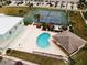 Aerial view of community pool, tennis courts, and clubhouse at 8150 Brent St # 713, Port Richey, FL 34668