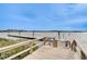 Beautiful view from the dock with scenic water views and a community building in the distance at 8150 Brent St # 713, Port Richey, FL 34668