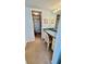 Dressing area with ample storage and vanity near bedroom at 8150 Brent St # 713, Port Richey, FL 34668
