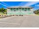 Charming two-story building with a well-manicured lawn and ample parking at 8150 Brent St # 713, Port Richey, FL 34668