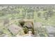 Aerial view of the home highlighting proximity to the golf course with a red line indicating property boundary at 8788 Fetterbush Ct, Brooksville, FL 34613