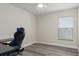 This bedroom features neutral walls and floors, plus a ceiling fan at 8788 Fetterbush Ct, Brooksville, FL 34613