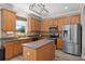 Well-equipped kitchen with stainless steel appliances and ample cabinet space at 8788 Fetterbush Ct, Brooksville, FL 34613