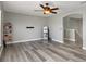 Living room featuring hardwood flooring and light gray walls at 8788 Fetterbush Ct, Brooksville, FL 34613