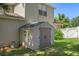 Backyard features a utility shed for all your storage needs at 8788 Fetterbush Ct, Brooksville, FL 34613