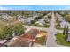 Aerial view of neighborhood with well-kept lawns and mature shade trees at 9220 Saint Regis Ln, Port Richey, FL 34668