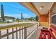 Cozy front porch featuring a bright exterior and bench seating at 9220 Saint Regis Ln, Port Richey, FL 34668