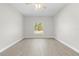 Bedroom featuring wood-look flooring and a ceiling fan at 11345 Thrasher Ave, Weeki Wachee, FL 34614