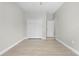 This bedroom features neutral colors, closet, and fan for relaxing comfort at 11345 Thrasher Ave, Weeki Wachee, FL 34614