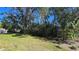 Backyard with a lush tree line at 12406 Eagleswood Dr # B, Hudson, FL 34667