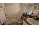 Standard bathroom featuring a bathtub, shower, and vanity at 12406 Eagleswood Dr # B, Hudson, FL 34667