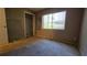 Modest bedroom with a closet and window at 12406 Eagleswood Dr # B, Hudson, FL 34667
