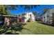 Charming two-story condo with beautiful landscaping and exterior staircases, offering a welcoming curb appeal at 12406 Eagleswood Dr # B, Hudson, FL 34667
