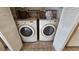 Convenient laundry room equipped with two modern washing machines at 12406 Eagleswood Dr # B, Hudson, FL 34667