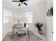 Bright and airy office space with desk, chair, natural light, and modern decor for a productive workspace at 12706 N Ola Ave, Tampa, FL 33612