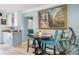 Cozy breakfast nook with a charming table, chairs, and custom built-in cabinets at 12757 Circle Lake Dr, Hudson, FL 34669