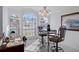 Inviting breakfast nook with bright windows, tile floors, and a cozy table setting at 150 Center Oak Cir, Spring Hill, FL 34609