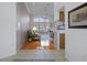 Inviting living room with hardwood floors, vaulted ceilings, and a view of the open floorplan at 150 Center Oak Cir, Spring Hill, FL 34609