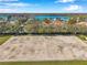 Enjoy a view from the neighborhood recreation area of a lake and surrounding homes at 1801 Loch Haven Ct, Trinity, FL 34655