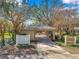 Community entrance with clear signage and landscaped surroundings, enhancing the neighborhood's welcoming appeal at 1801 Loch Haven Ct, Trinity, FL 34655
