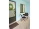 Charming entrance featuring a decorative wreath and a cozy seating area at 1955 Abrico Dr # G12, Lutz, FL 33558