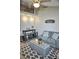 A cozy living room featuring vaulted ceiling with loft and modern decor at 1955 Abrico Dr # G12, Lutz, FL 33558