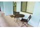 Cozy patio area with outdoor seating perfect for enjoying a morning coffee at 1955 Abrico Dr # G12, Lutz, FL 33558