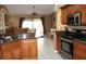 Modern kitchen with stainless steel appliances and granite countertops at 2233 Egret Walk Ct, New Port Richey, FL 34655