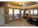 Well-lit living area with tile flooring, perfect for entertaining guests or relaxing at 2233 Egret Walk Ct, New Port Richey, FL 34655