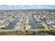 Overhead view of the home and property showing the surrounding waterfront canals and neighborhood at 3449 Companero Entra, Hernando Beach, FL 34607