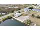 Drone shot of the property highlighting the private dock with the waterfront, and its neighborhood location at 3449 Companero Entra, Hernando Beach, FL 34607