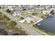 Aerial view of the property highlighting its waterfront location, private dock, and neighborhood streets at 3449 Companero Entra, Hernando Beach, FL 34607