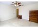 Spacious bedroom featuring a ceiling fan, and wooden dressers for storage at 469 Fairbanks Rd, Spring Hill, FL 34608