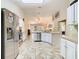 Open-concept kitchen with stainless steel appliances and lots of counter space at 469 Fairbanks Rd, Spring Hill, FL 34608