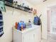 Utility Room featuring a white washer and dryer with storage shelves at 469 Fairbanks Rd, Spring Hill, FL 34608