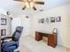 Office featuring desk, office chair, carpet flooring and a ceiling fan at 469 Fairbanks Rd, Spring Hill, FL 34608