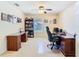 This spacious home office offers dual work spaces, storage and an abundance of natural light at 469 Fairbanks Rd, Spring Hill, FL 34608