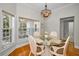Sunlit breakfast nook with a view of the outdoors at 5050 Limestone Dr, Port Richey, FL 34668
